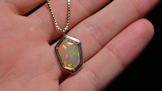 geomtric cut designer opal in solid silver and 14k yellow gold by jeweler and gemcutter curtis r jewellery 