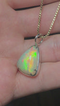 Load and play video in Gallery viewer, White Triangle Opal Charm
