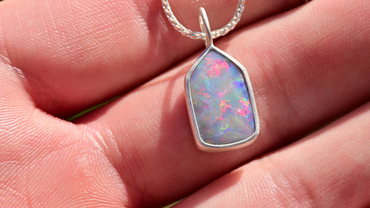 rainbow australian opal charm in matte silver by jewelry artist and lapidary cutter curtis r jewellery 