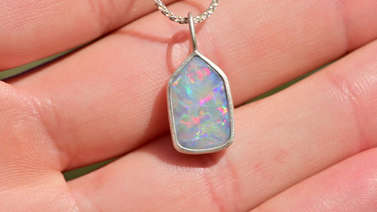 rainbow australian opal charm in matte silver by jewelry artist and lapidary cutter curtis r jewellery 