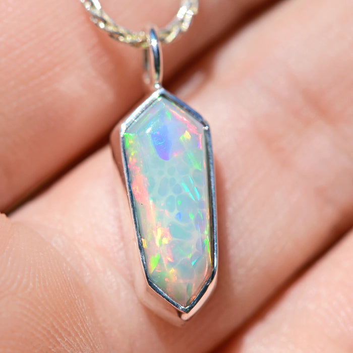 designer prism cut rainbow welo opal with rare honeycomb pattern in silver by curtis r jewellery 