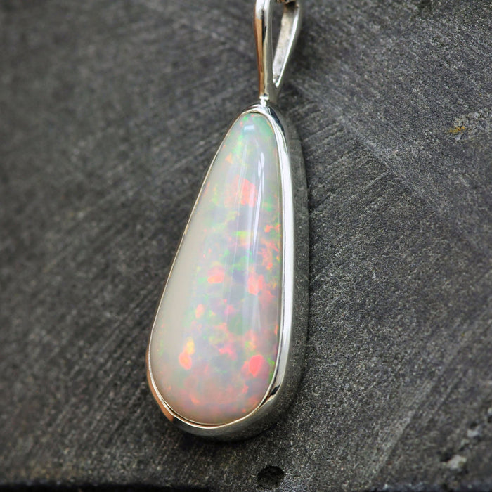 big white pear opal long crop pendant in sterling silver