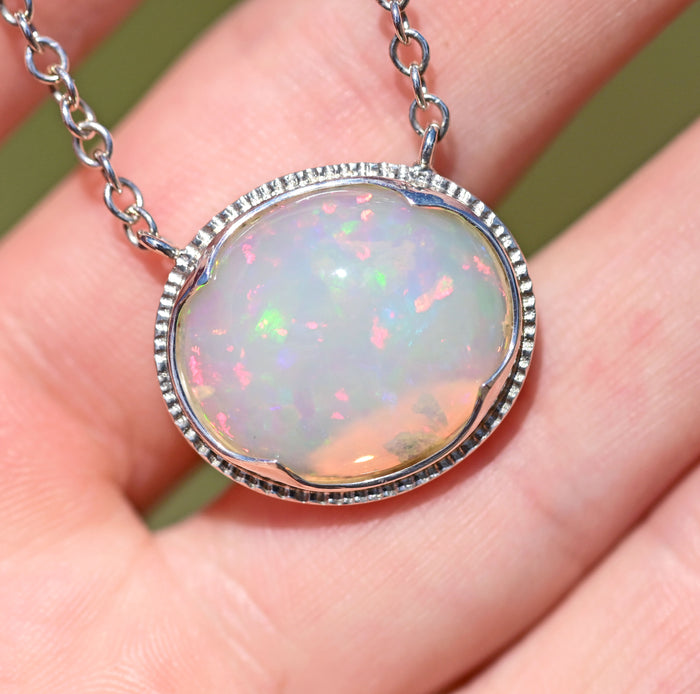 large white opal cabochon with rainbow play of colour, gem quality opal necklace by curtis r jewel